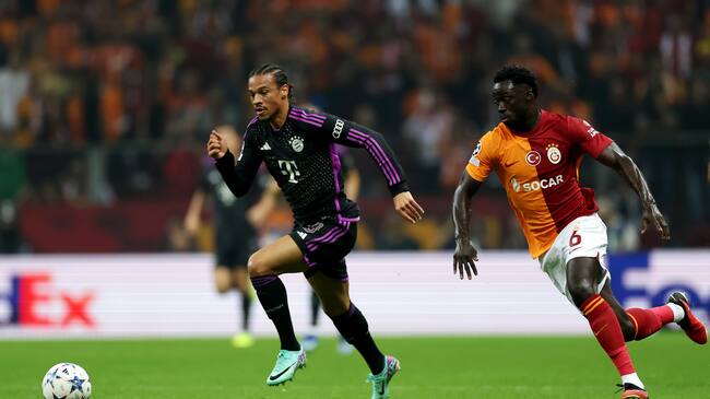 Dávinson Machado marcando a Leroy Sané. (Photo by Lars Baron - UEFA/UEFA via Getty Images)