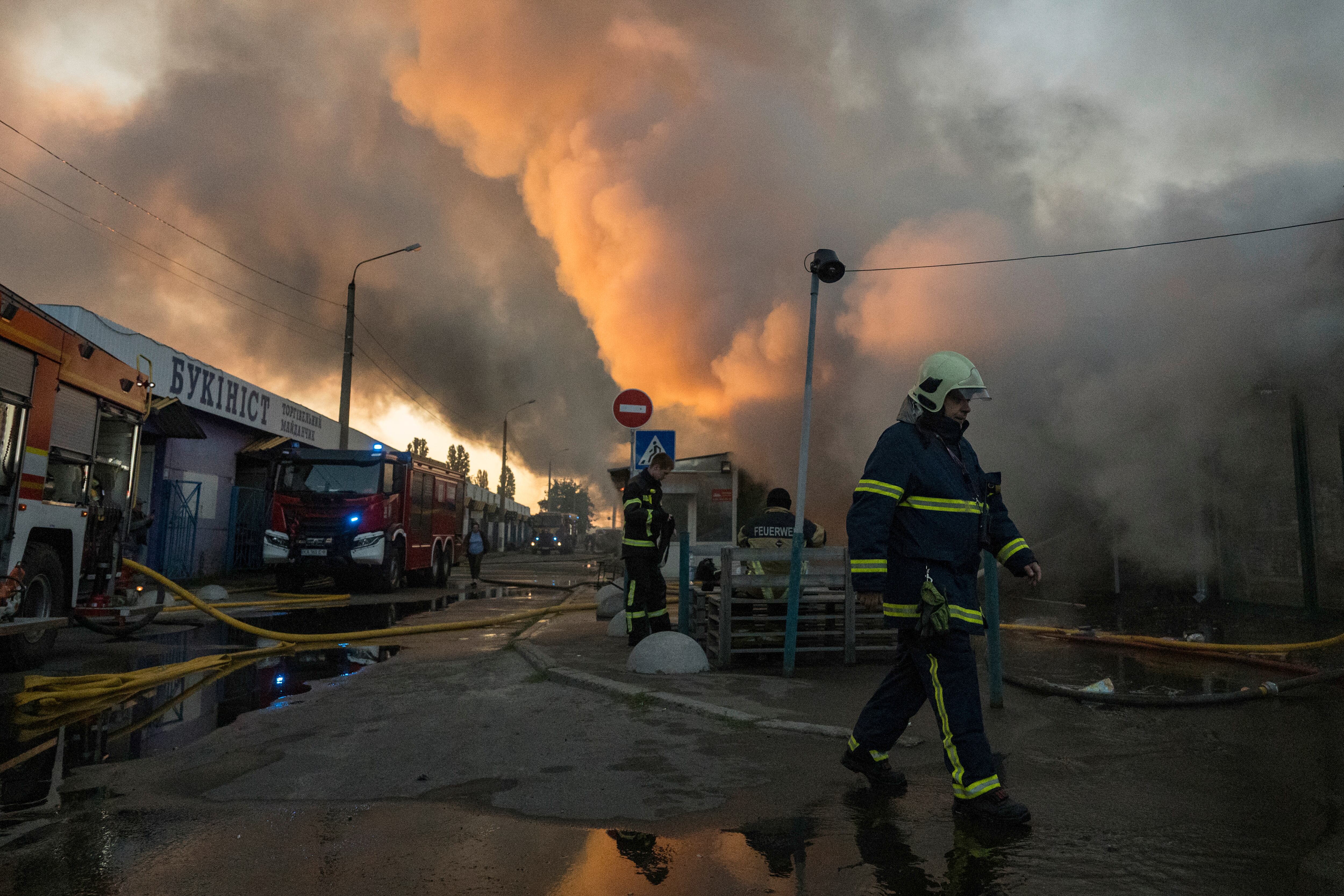 Firefighters work to extinguish a fire at a book market in Kyiv, Ukraine, on August 16, 2026. . (Photo by Maxym Marusenko/NurPhoto via Getty Images)
