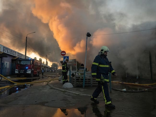 Firefighters work to extinguish a fire at a book market in Kyiv, Ukraine, on August 16, 2026. . (Photo by Maxym Marusenko/NurPhoto via Getty Images)