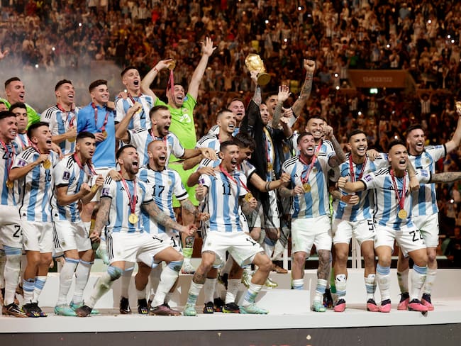 LUSAIL CITY, QATAR - DECEMBER 18: Lionel Messi of Argentina and team celebrate after winning the FIFA World Cup Qatar 2022 Final match between Argentina and France at Lusail Stadium on December 18, 2022 in Lusail City, Qatar. (Photo by Richard Sellers/Getty Images)
