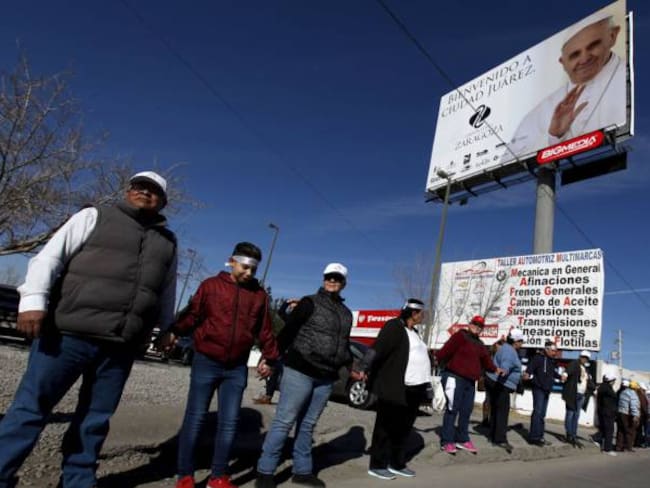 Un grupo de voluntarios para la visita del Papa en Ciudad Juárez.