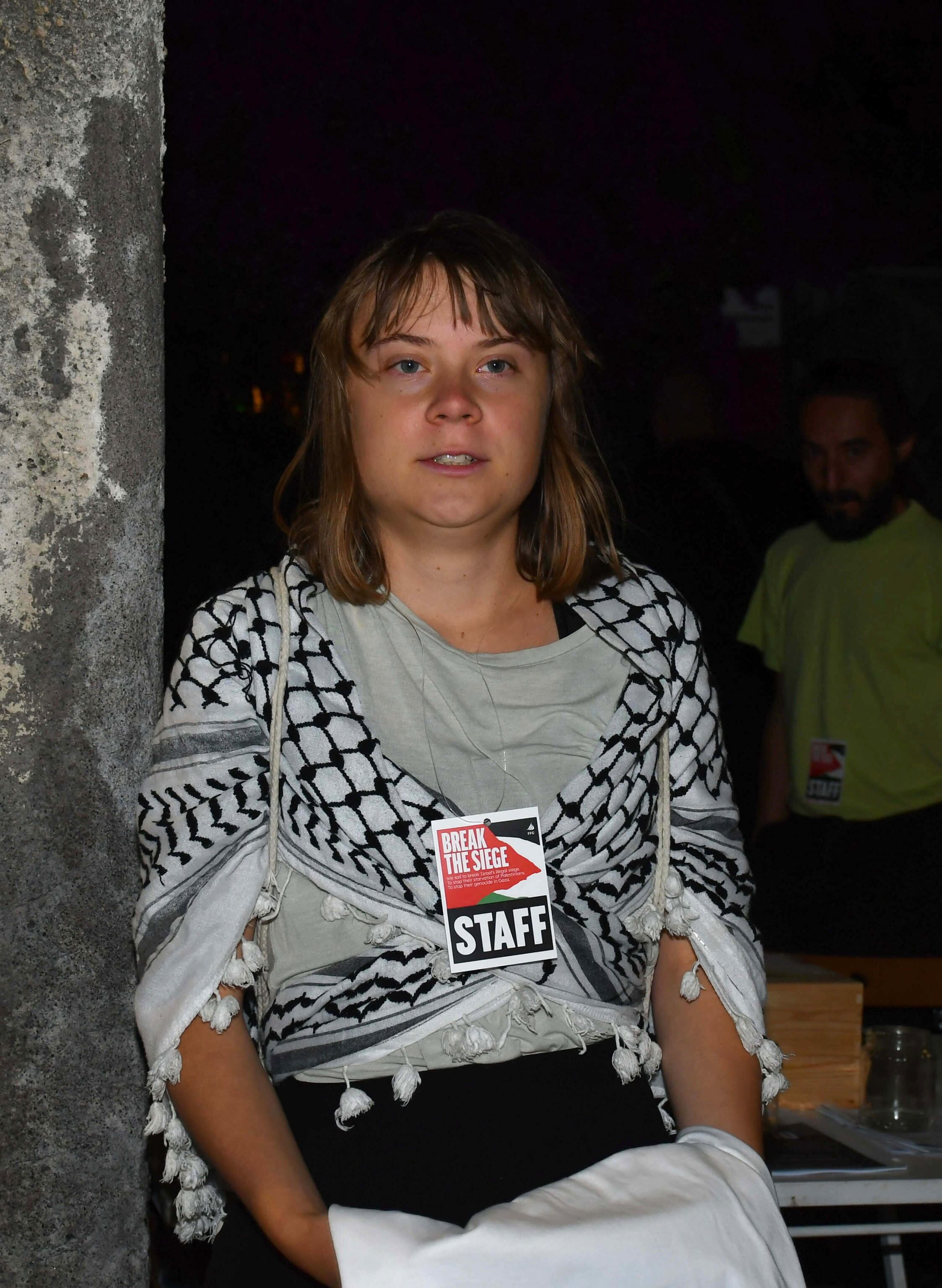 Catania (Italy), 30/05/2025.- Greta Thunberg looks after arriving on board the ship 'Madleen' of the NGO Freedom Flotilla Coalition (FFC) in Catania, where the Swedish activist and Irish actor Liam Cunningham will hold a panel dedicated to the humanitarian aid mission leaving for Gaza at Etna Comics, in Catania, Sicily, Italy, 30 May 2025. More than 54,200 Palestinians have been killed in the Gaza Strip, according to the Palestinian Ministry of Health, since Israel launched a military campaign in the strip in response to a cross-border attack led by the Palestinian militant group Hamas on 07 October 2023, in which about 1,200 Israelis were killed and more than 250 taken hostage. (Italia) EFE/EPA/ORIETTA SCARDINO