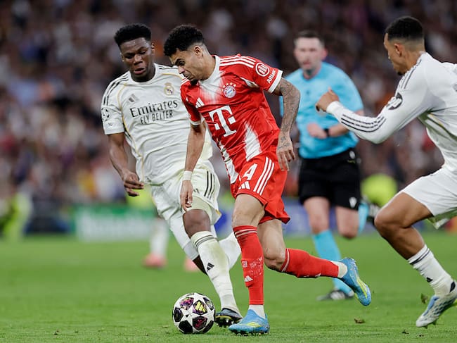 MADRID, SPAIN - APRIL 7: (L-R) Aurelien Tchouameni of Real Madrid, Luis Diaz of FC Bayern Munchen, Trent Alexander Arnold of Real Madrid during the UEFA Champions League match between Real Madrid v Bayern Munchen at the Estadio Santiago Bernabeu on April 7, 2026 in Madrid Spain (Photo by Maria Gracia Jimenez/Soccrates/Getty Images)