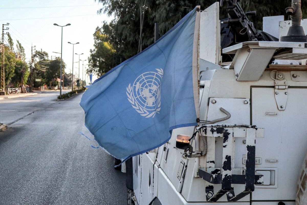 A United Nations flag flies in the back of one of the armoured vehicles of the UN Interim Force in Lebanon (UNIFIL) during a patrol around Marjayoun in south Lebanon on October 8, 2024. (Photo by AFP)