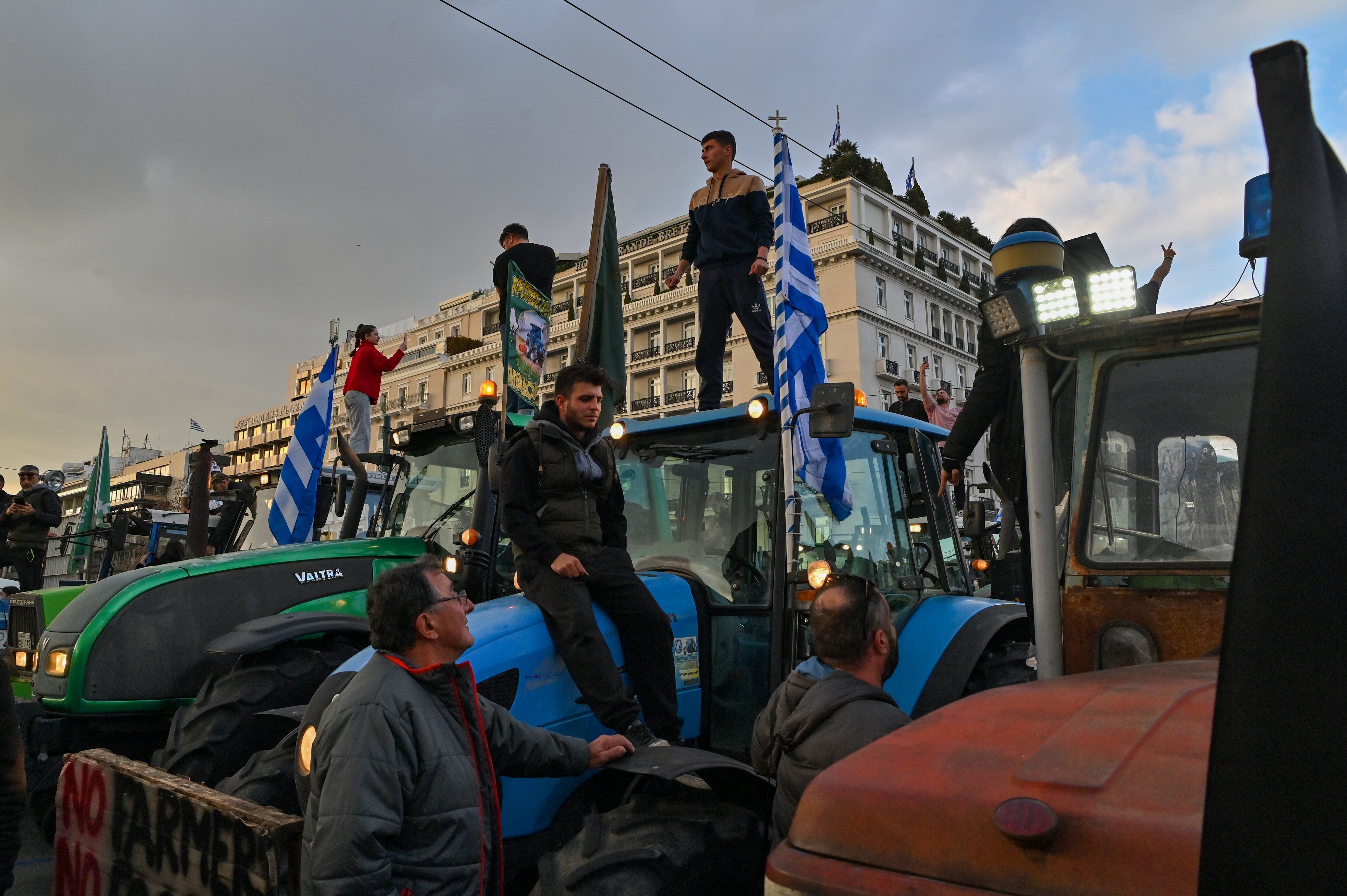 ATHENS, GREECE - FEBRUARY 20:Greek farmers, with their tractors, protest near the Greek parliament. Photo by Milos Bicanski/Getty Images.