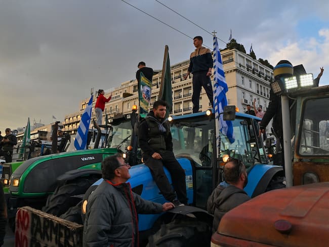 ATHENS, GREECE - FEBRUARY 20:Greek farmers, with their tractors, protest near the Greek parliament. Photo by Milos Bicanski/Getty Images.