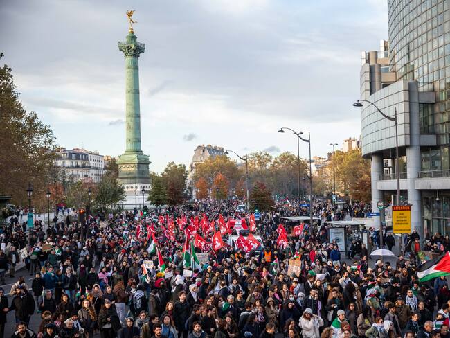 PARIS, FRANCE - NOVEMBER 04: People gather as they carry Palestinian flags and banners to stage a demonstration in support of Palestinians in Paris, France on November 04, 2023. (Photo by Ibrahim Ezzat/Anadolu via Getty Images)