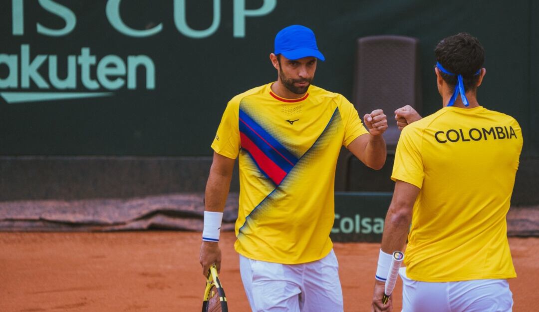 Cabal y Farah festejan uno de sus puntos en el duelo ante Turquía.