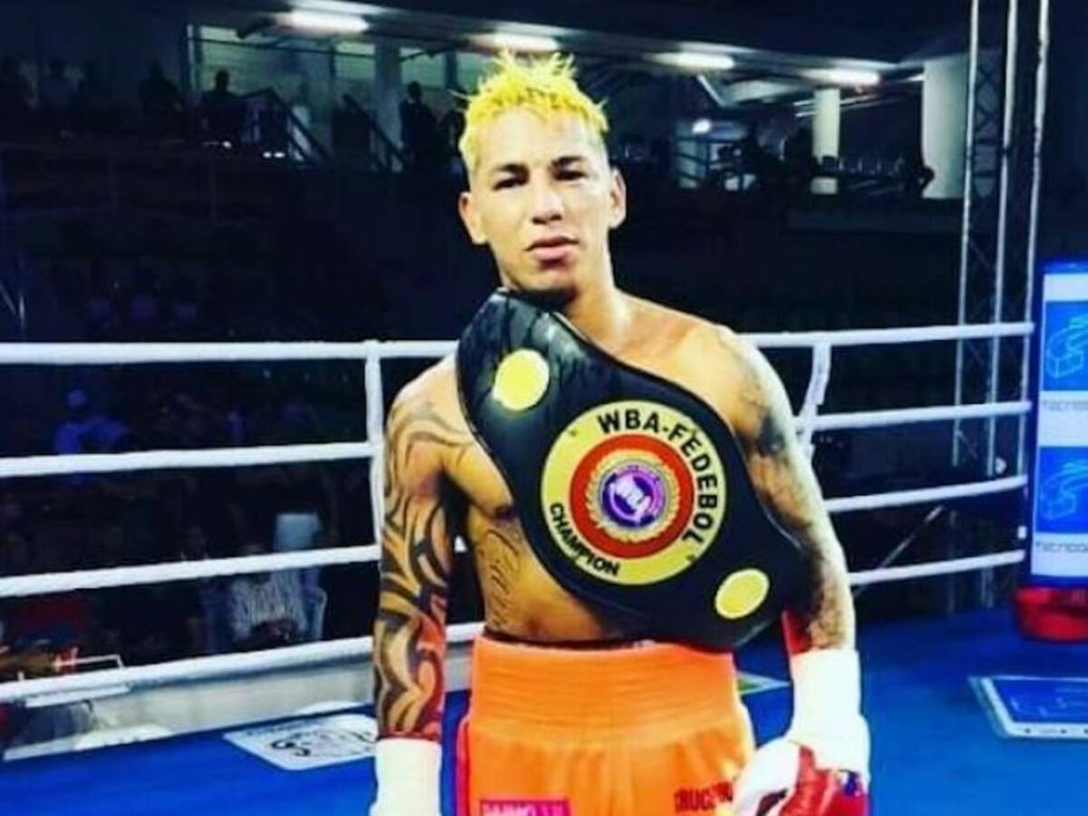 El boxeador colombiano que subastará su fajín para donar mercados