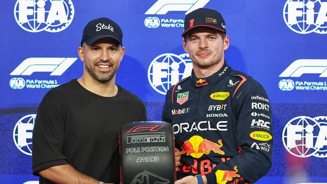 ABU DHABI, UNITED ARAB EMIRATES - NOVEMBER 25: Sergio Aguero of Argentina presents Max Verstappen of the Netherlands and Oracle Red Bull Racing with the pole position award in parc feme during qualifying ahead of the F1 Grand Prix of Abu Dhabi at Yas Marina Circuit on November 25, 2023 in Abu Dhabi, United Arab Emirates. (Photo by )