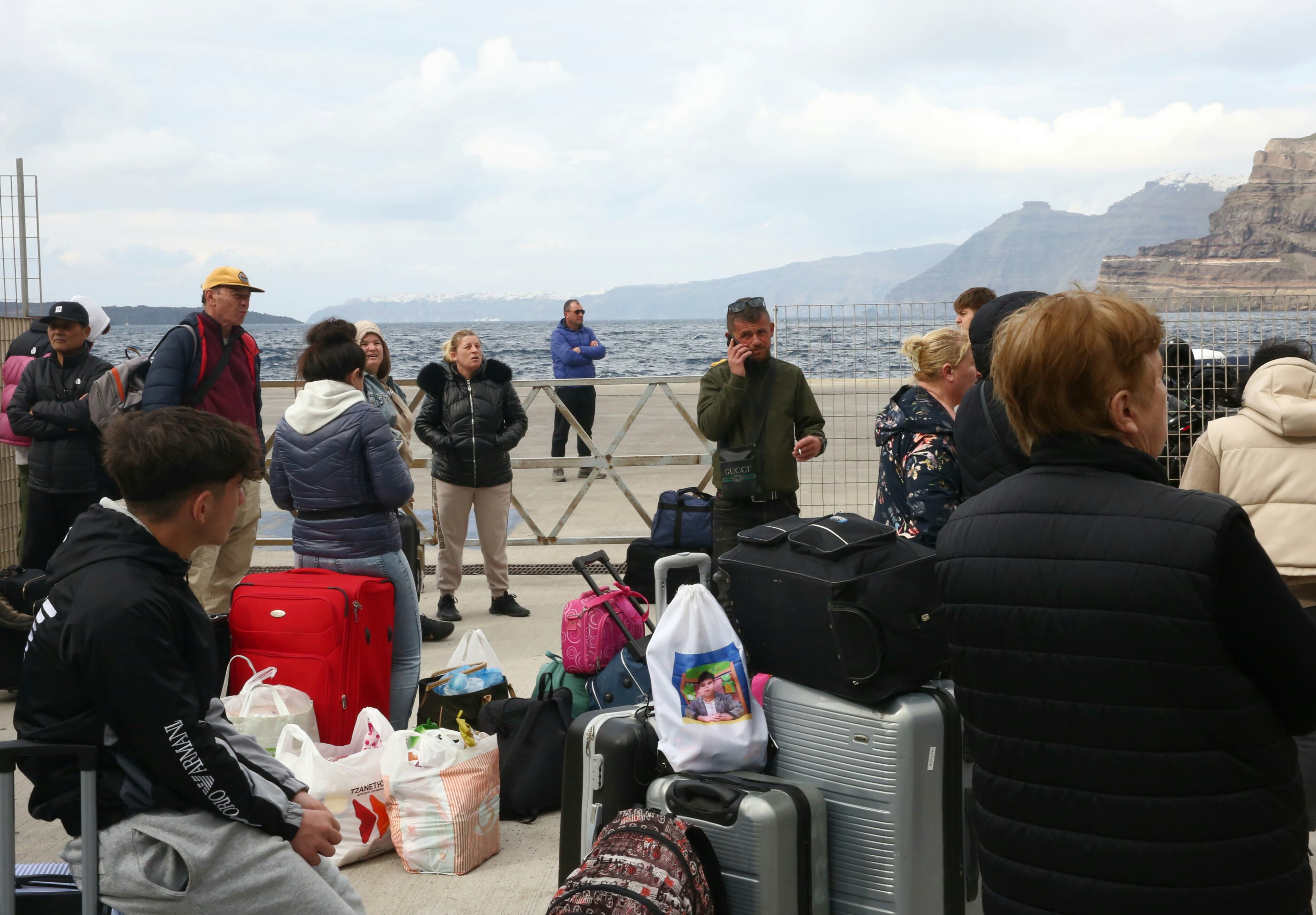 Santorini (Greece), Residents and visitors wait to leave the island due to the increased seismic activity, at the port of Athinios in Santorini island, Greece. 