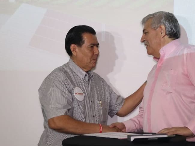 Carlos Alvarado, gerente de Mercacentro y Alejandro Inostroza, gerente de Enertolima