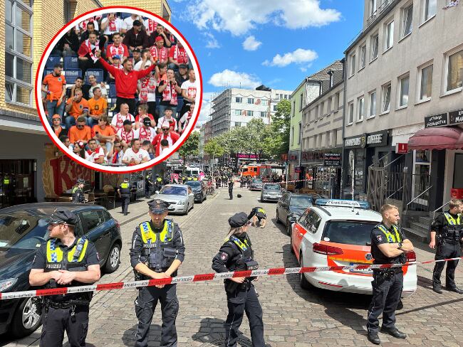 La policía alemana acordonó una zona de Hamburgo donde fue detenido un hombre que amenazaba con atacar hinchas de Polonia y Holanda con un hacha.
(Foto: Caracol Radio / Getty )