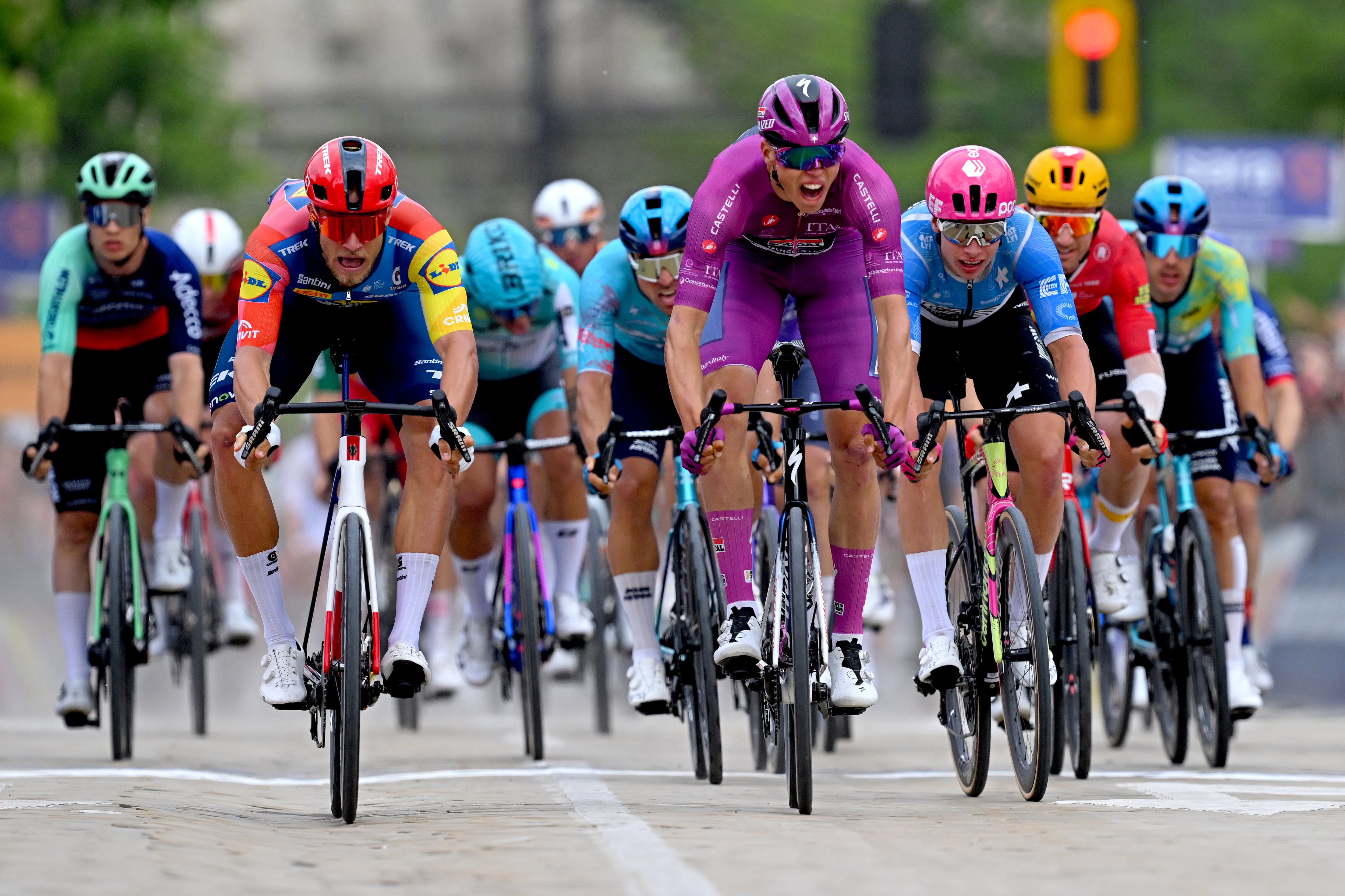 SOFIA, BULGARIA - MAY 10: Paul Magnier of France and Team Soudal Quick-Step - Purple Points Jersey celebrates at finish line as stage winner ahead of Jonathan Milan of Italy and Team Lidl - Trek and Madis Mihkels of Estonia and Team EF Education - EasyPost during the 109th Giro d'Italia 2026, Stage 3 a 175km stage from Plovdiv to Sofia / #UCIWT / on May 10, 2026 in Sofia, Bulgaria. (Photo by Tim de Waele/Getty Images)