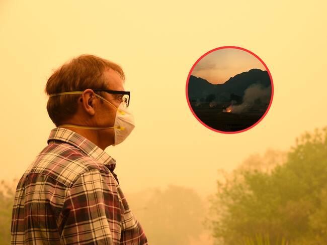 Persona protegiéndose de la mala calidad del aire con un tapabocas (Fotos vía Getty Images)