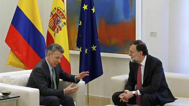 El presidente del Gobierno español, Mariano Rajoy, y el de Colombia, Juan Manuel Santos. Foto: Associated Press - AP