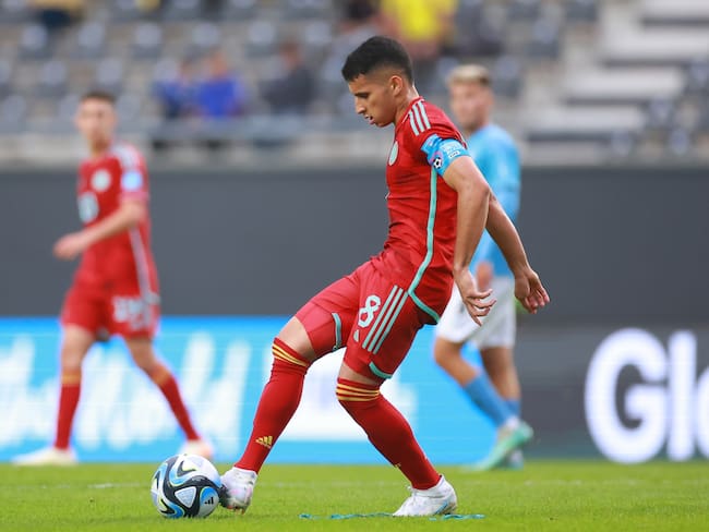 LA PLATA, ARGENTINA - MAY 21: Gustavo Puerta of Colombia passes the ball during the FIFA U-20 World Cup Argentina 2023 Group C match between Israel and Colombia at Estadio Unico Diego Armando Maradona on May 21, 2023 in La Plata, Argentina. (Photo by Hector Vivas - FIFA/FIFA via Getty Images)
