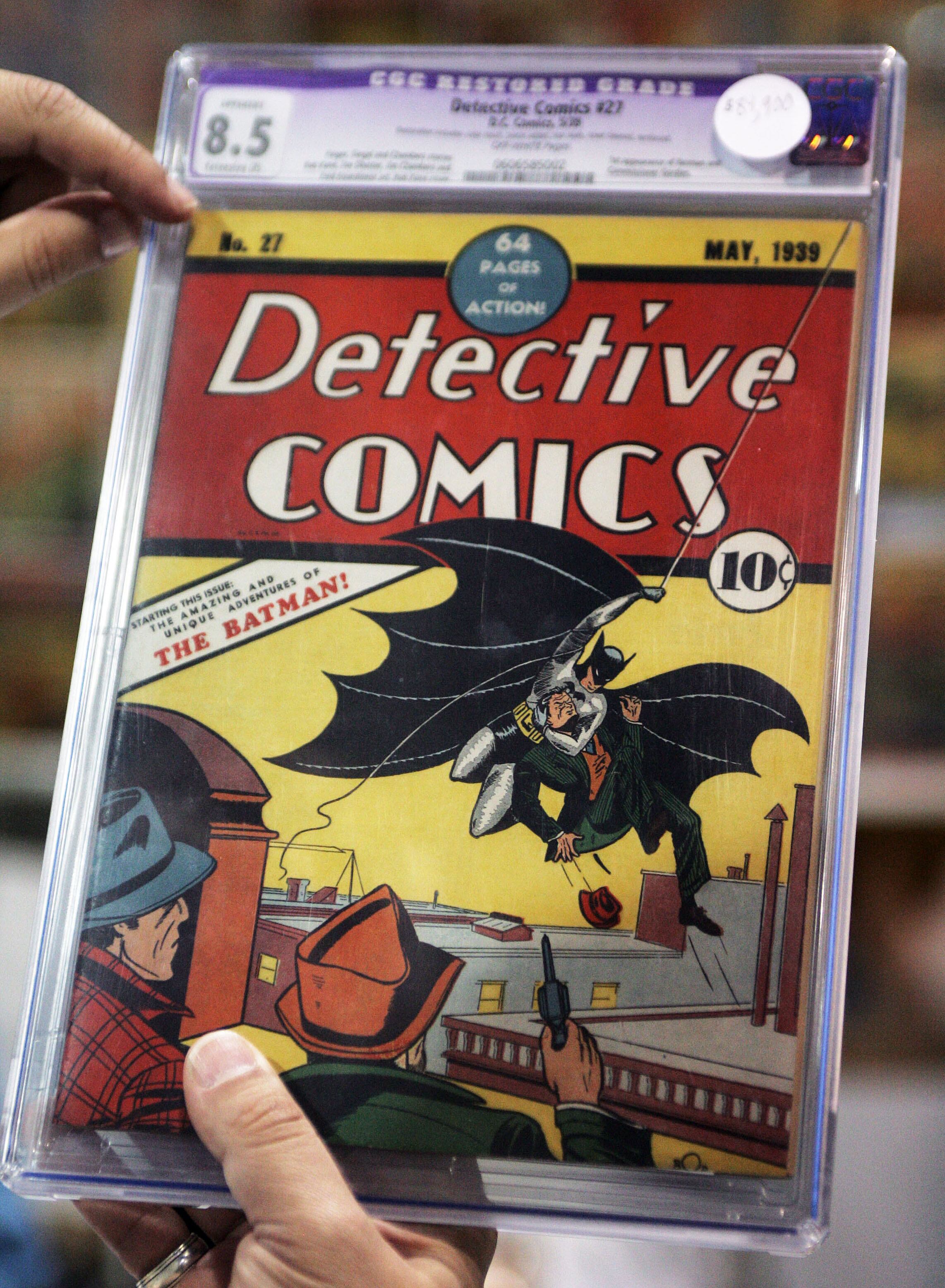 Certified Guaranty Company (CGC) has created a Comic book controversy over the whole concept of slabbing comic books. Slabbing is when the book is graded and then sealed into a secure plastic case. Steven Borock, Primary Grader, Restoration Detection Expert with CGC,shows off Detective Comics @@#27. from May of 1939 featuring the debut of Batman. It is one of the rarest of comic books, encased and graded with a CGC 'slabe', Sunday, July 29 2007, at ComicCon in San Diego.  (Photo by Spencer Weiner/Los Angeles Times via Getty Images)
