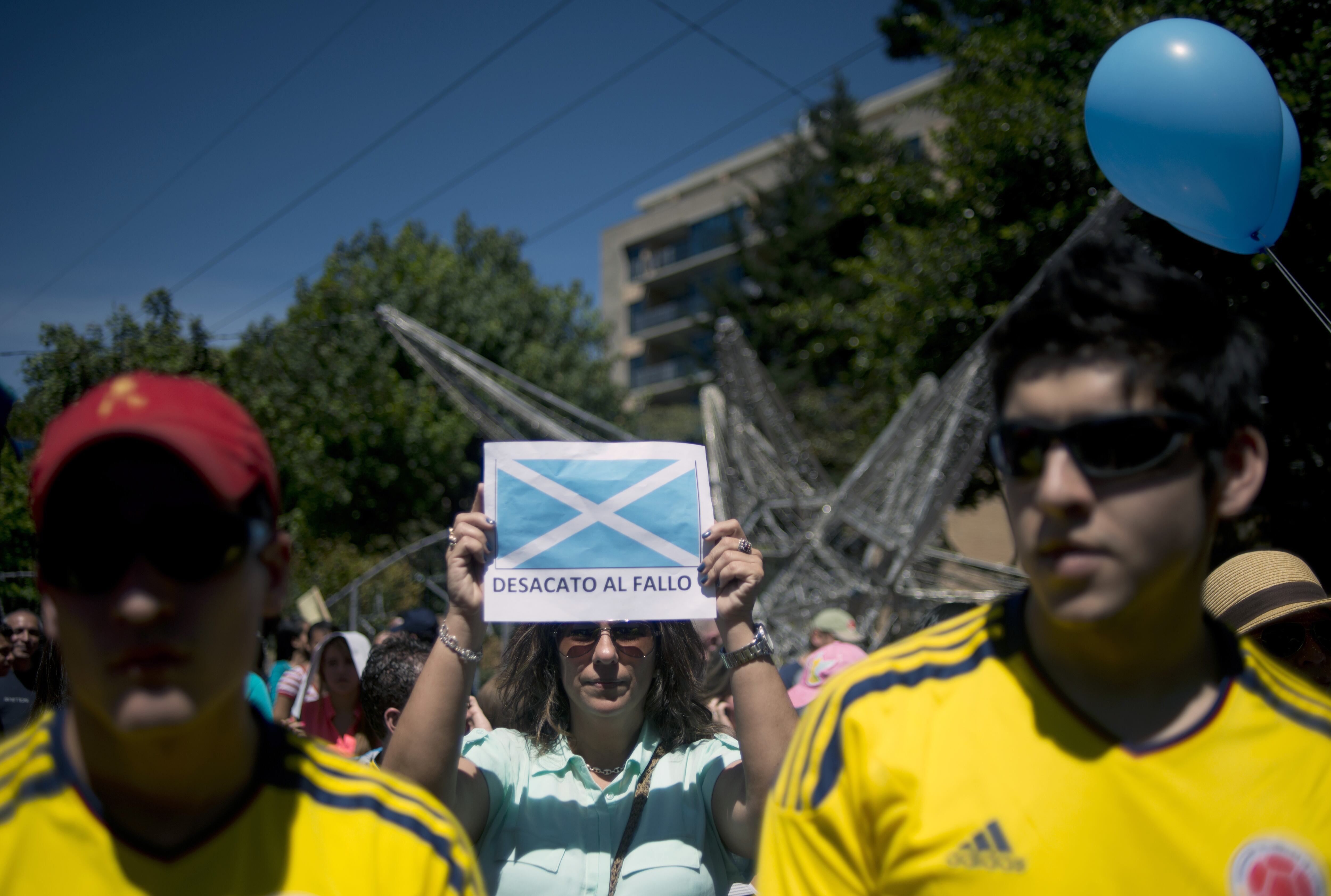 People demonstrate against the ruling of the International Court of Justice which granted a large swathe of sea territory to Nicaragua, in Bogota , on November 25, 2012. Photo EITAN ABRAMOVICH/AFP via Getty Images.