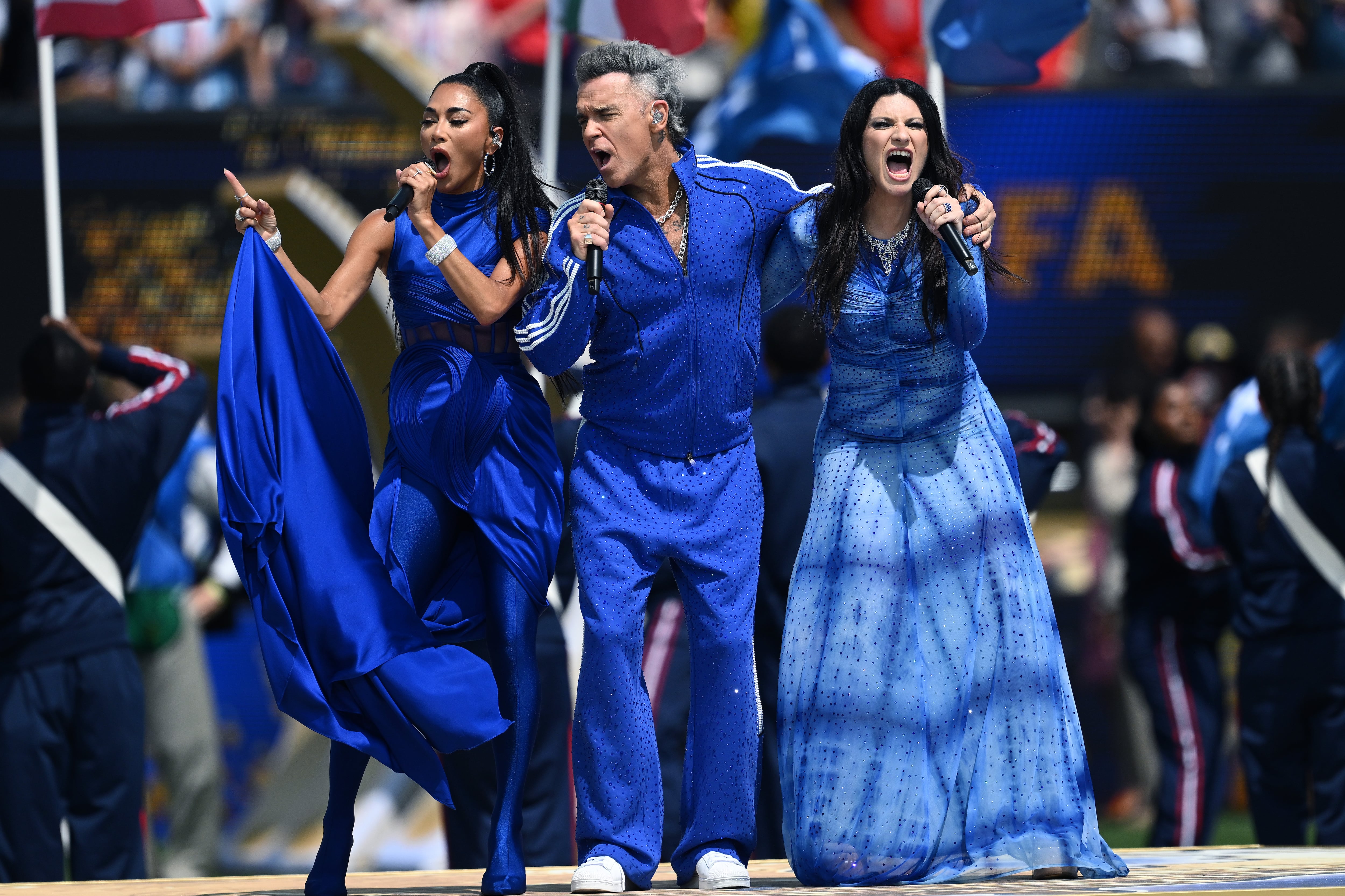 EAST RUTHERFORD, NEW JERSEY - JULY 19: Laura Pausini Robbie Williams and Nicole Scherzinger perform during the FIFA World Cup 2026 Final match between Spain and Argentina at New York New Jersey Stadium on July 19, 2026 in East Rutherford, New Jersey. (Photo by Image Photo Agency/Getty Images)