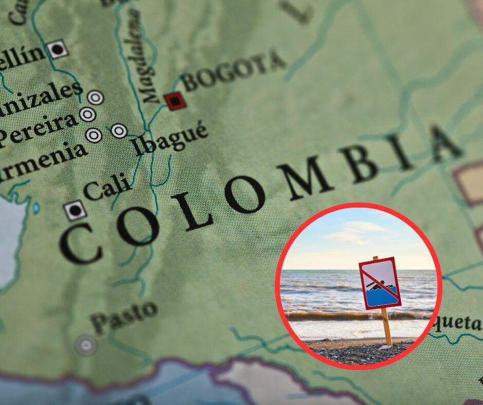 Close-up mapa Colombia y señal de no nadar en playa (Getty Images)