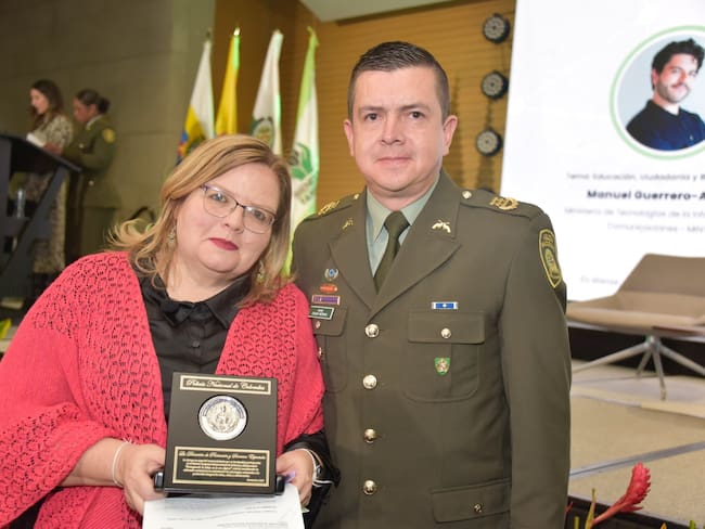 Coronel Joaquín Medrano y la directora del ICBF, Astrid Cáceres.