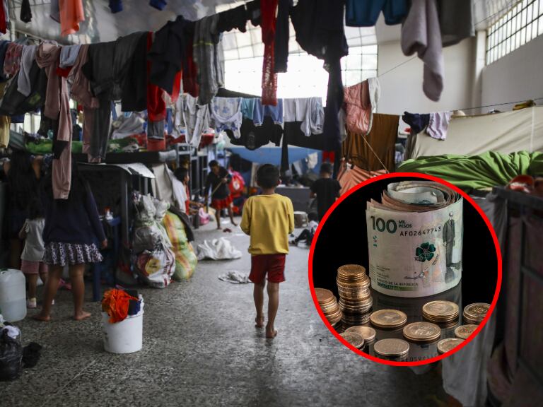 Niños en una zona con ropa colgada; dinero colombiano. (Foto: Getty Images)