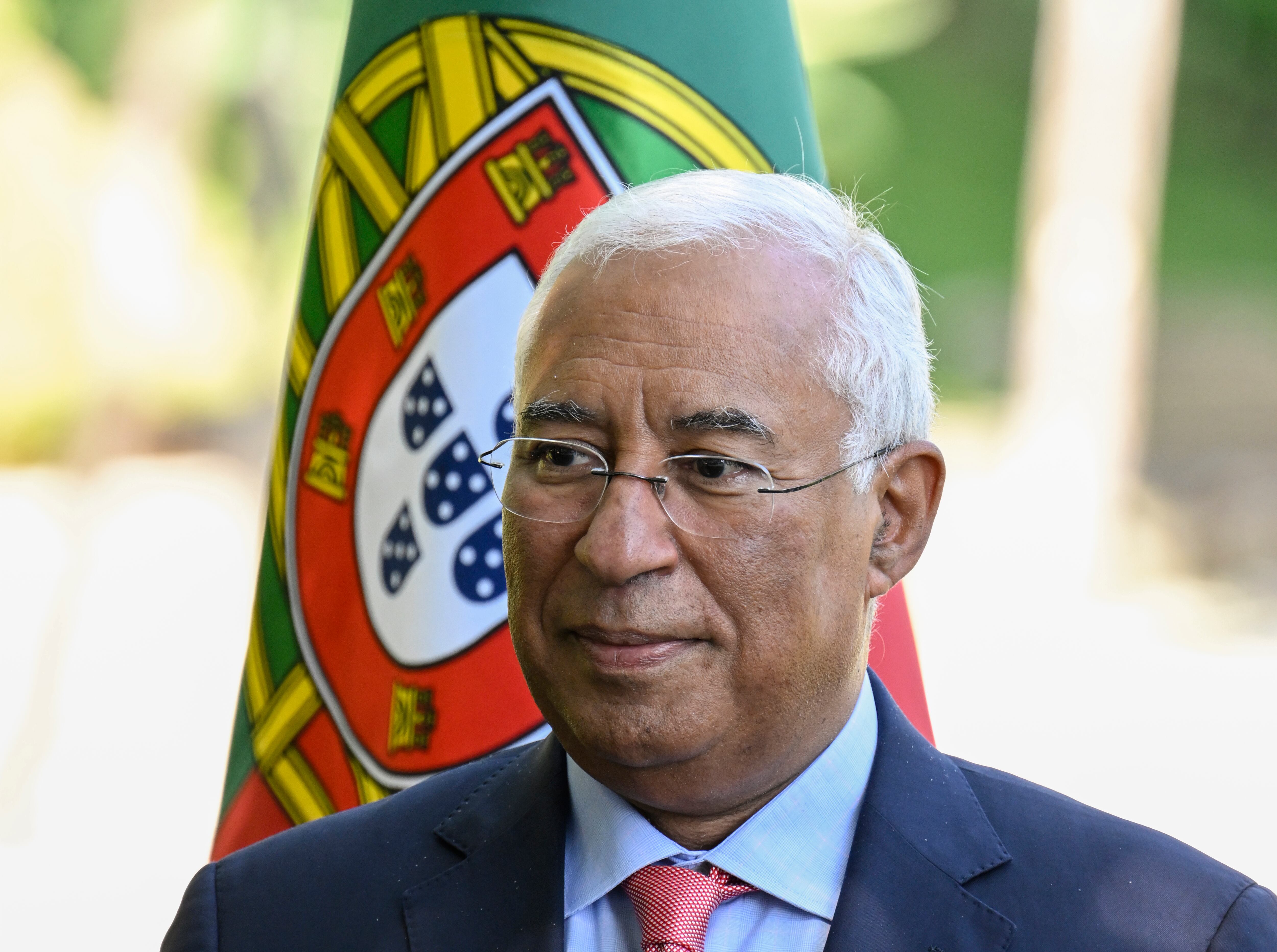LISBON, PORTUGAL - OCTOBER 09: Portuguese Prime Minister Antonio Costa stands in front of a Portuguese flag during the signature of memorandums of agreement at the end of the one-on-one meeting with the President of Romania Klaus Iohannis at the PM Official Residence during the last of the Romanian president three-day State Visit to the country on October 09, 2023, in Lisbon, Portugal. The President of Romania Klaus Iohannis also met with the Portuguese President Marcelo Rebelo de Sousa, Lisbon Mayor Carlos Moedas, and the President of Portuguese Parliament Augusto Santos Silva. (Photo by Horacio Villalobos#Corbis/Corbis via Getty Images)