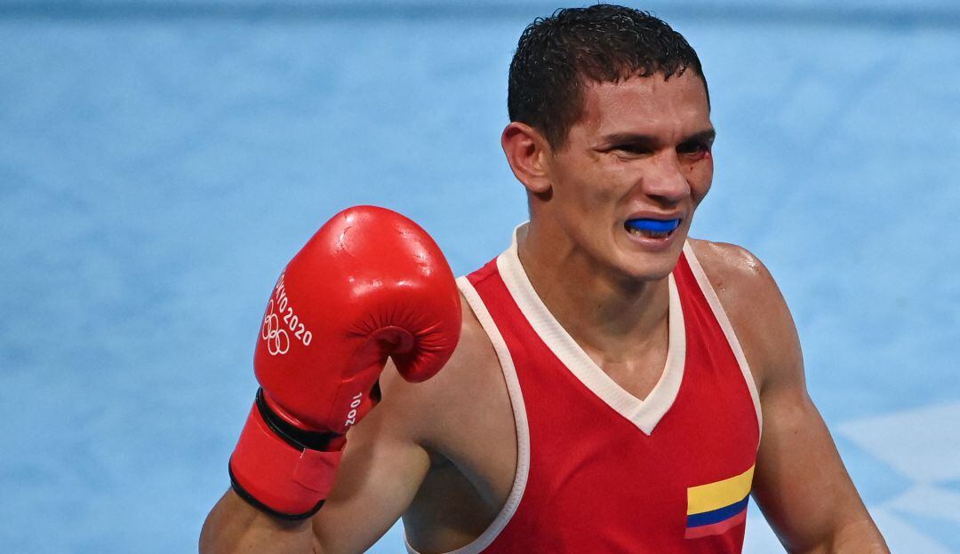 Ceiber Ávila festeja su victoria y clasificación a los cuartos de final del boxeo 57kg.