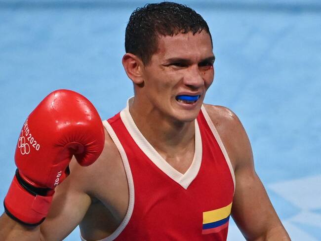 Ceiber Ávila festeja su victoria y clasificación a los cuartos de final del boxeo 57kg.