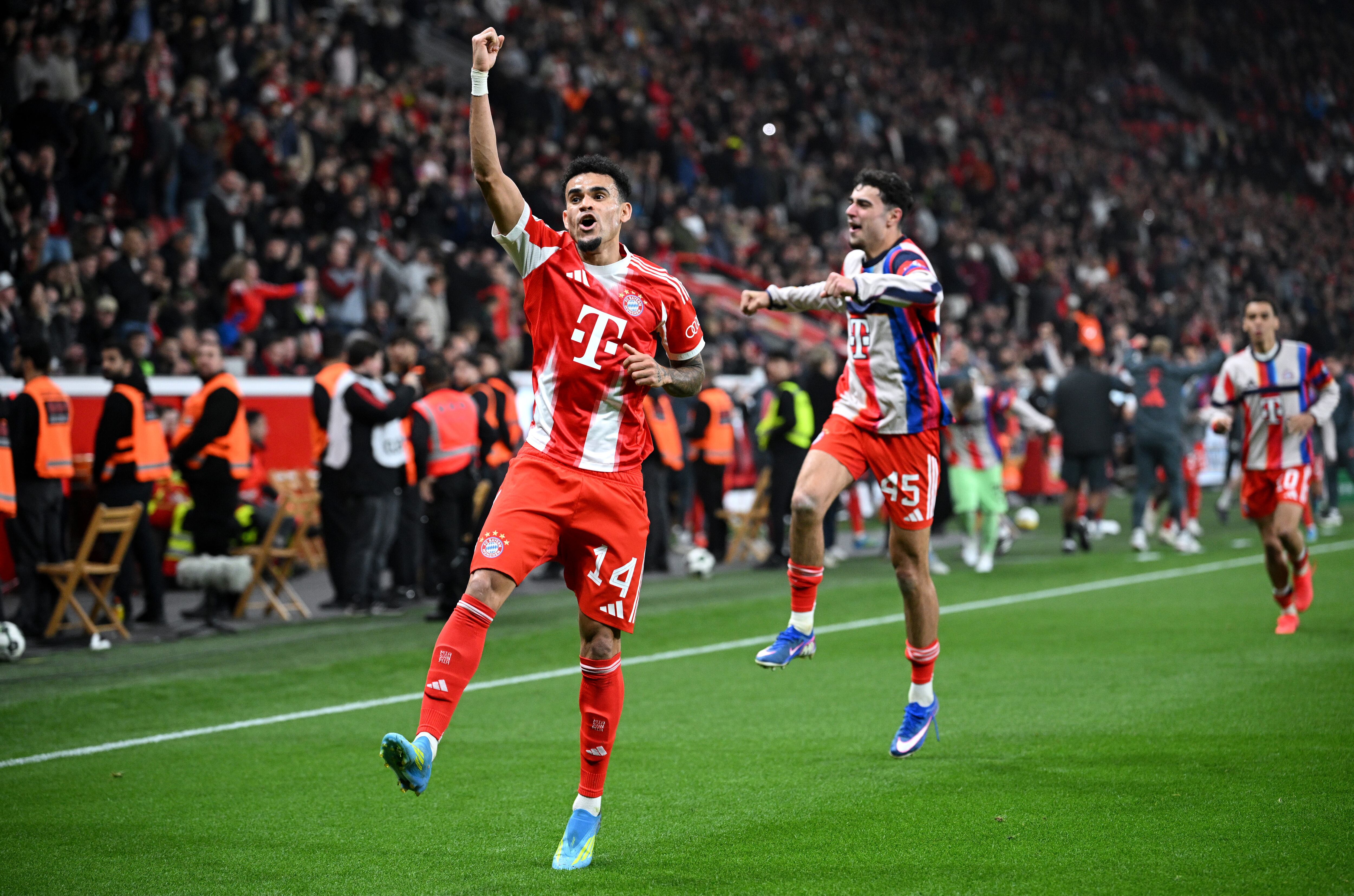 LEVERKUSEN, GERMANY - APRIL 22: Luis Diaz of FC Bayern Munich celebrates scoring his team's second goal during the DFB Cup semifinal match between Bayer 04 Leverkusen and FC Bayern München at BayArena on April 22, 2026 in Leverkusen, Germany. (Photo by Stuart Franklin/Getty Images)