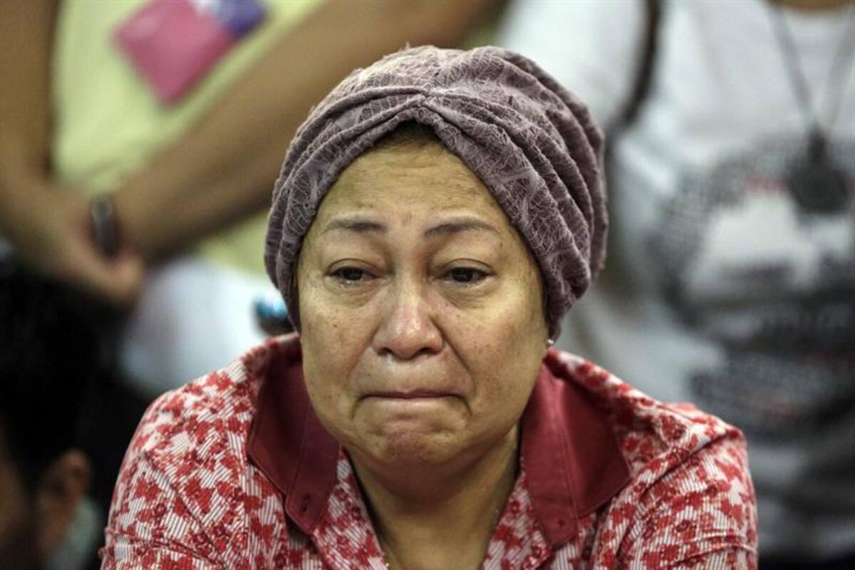 Fotos de EFE y del portal ruso lifenews.ru en el sitio de la tragedia y la angustia de las familias en el aeropuerto de Kuala Lumpur.