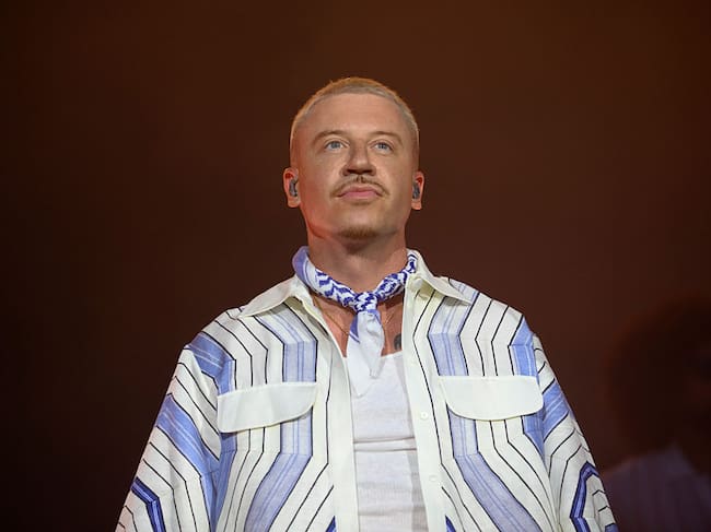 PARIS, FRANCE - JULY 19: American rapper Macklemore performs live on stage during the 5th Lollapalooza Paris Festival on July 19, 2025 in Paris, France. (Photo by Kristy Sparow/Getty Images)