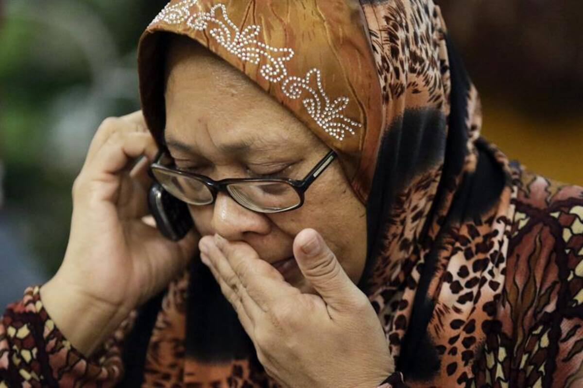 Fotos de EFE y del portal ruso lifenews.ru en el sitio de la tragedia y la angustia de las familias en el aeropuerto de Kuala Lumpur.