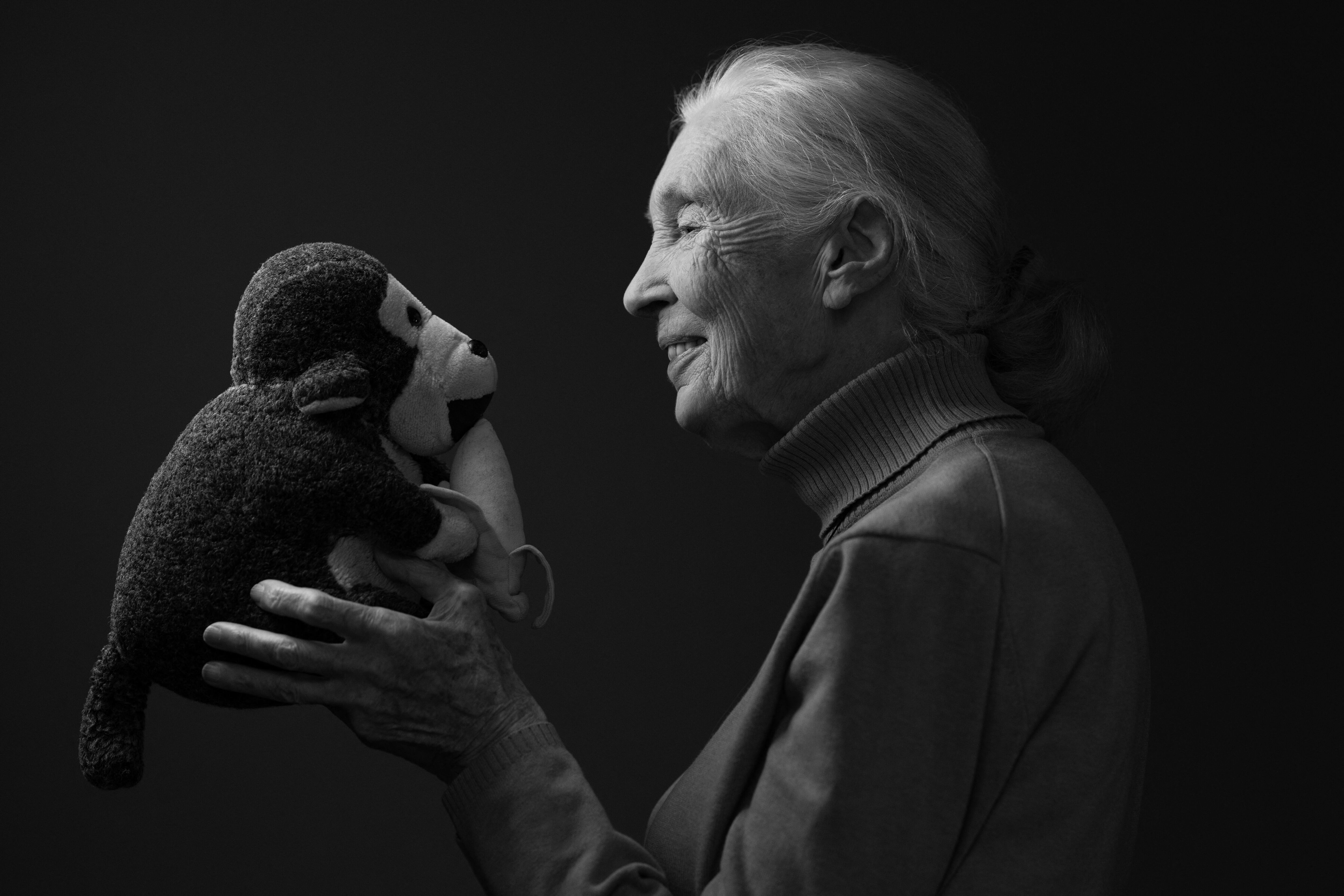 British ethologist and primatologist Jane Goodall poses with her mascott "Mister H" during a photo session on October 18, 2024 in Paris. (Photo by JOEL SAGET / AFP)