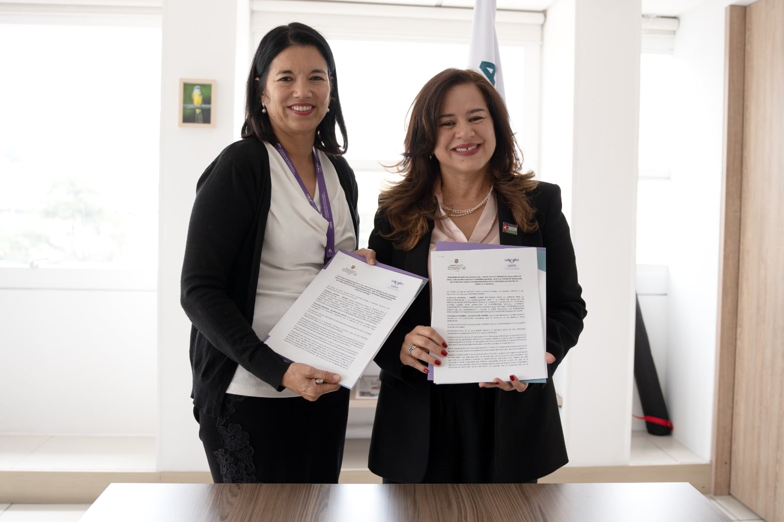 Luz Janeth Forero, directora de la Unidad de Búsqueda y Alejandra Miller, directora de la Agencia para la Reincorporación y la Normalización