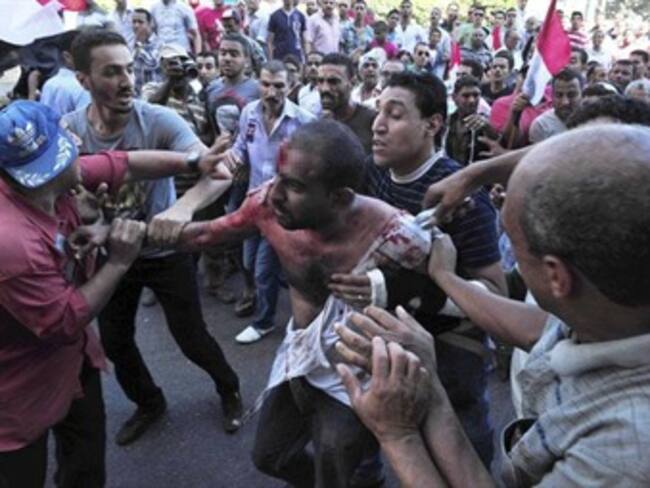 Obama condena violencia en Egipto y cancela reunión de entrenamiento militar