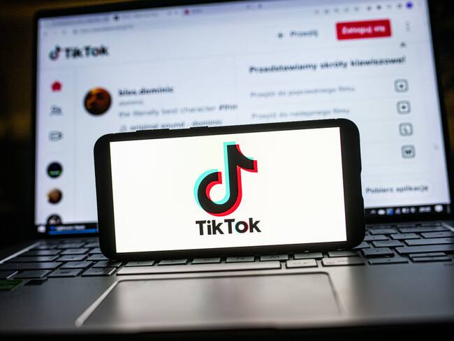 POLAND - 2023/01/20: In this photo illustration a TikTok logo seen displayed on a smartphone. (Photo Illustration by Mateusz Slodkowski/SOPA Images/LightRocket via Getty Images)