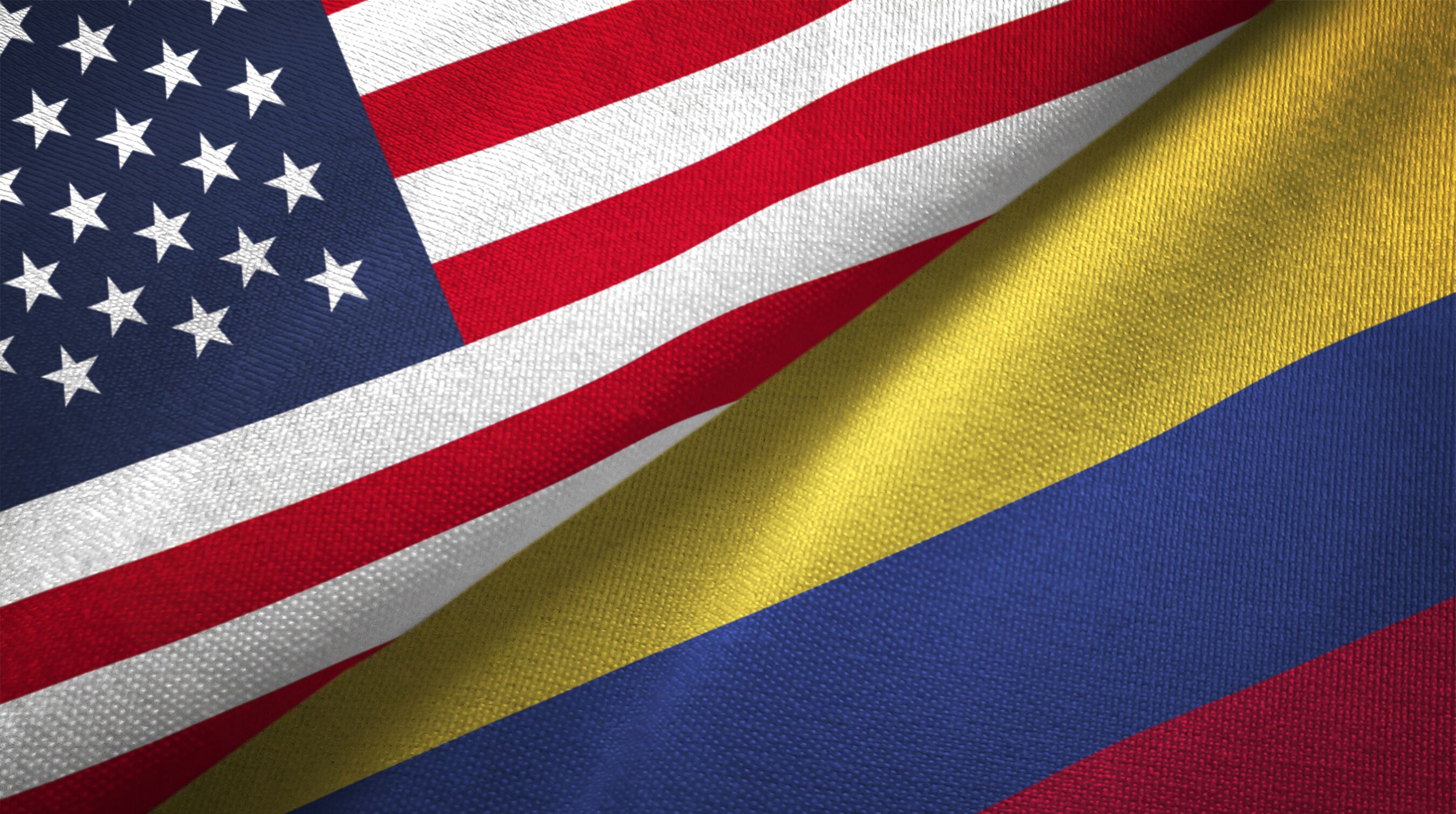Colombia and United States flags together realtions textile cloth fabric texture