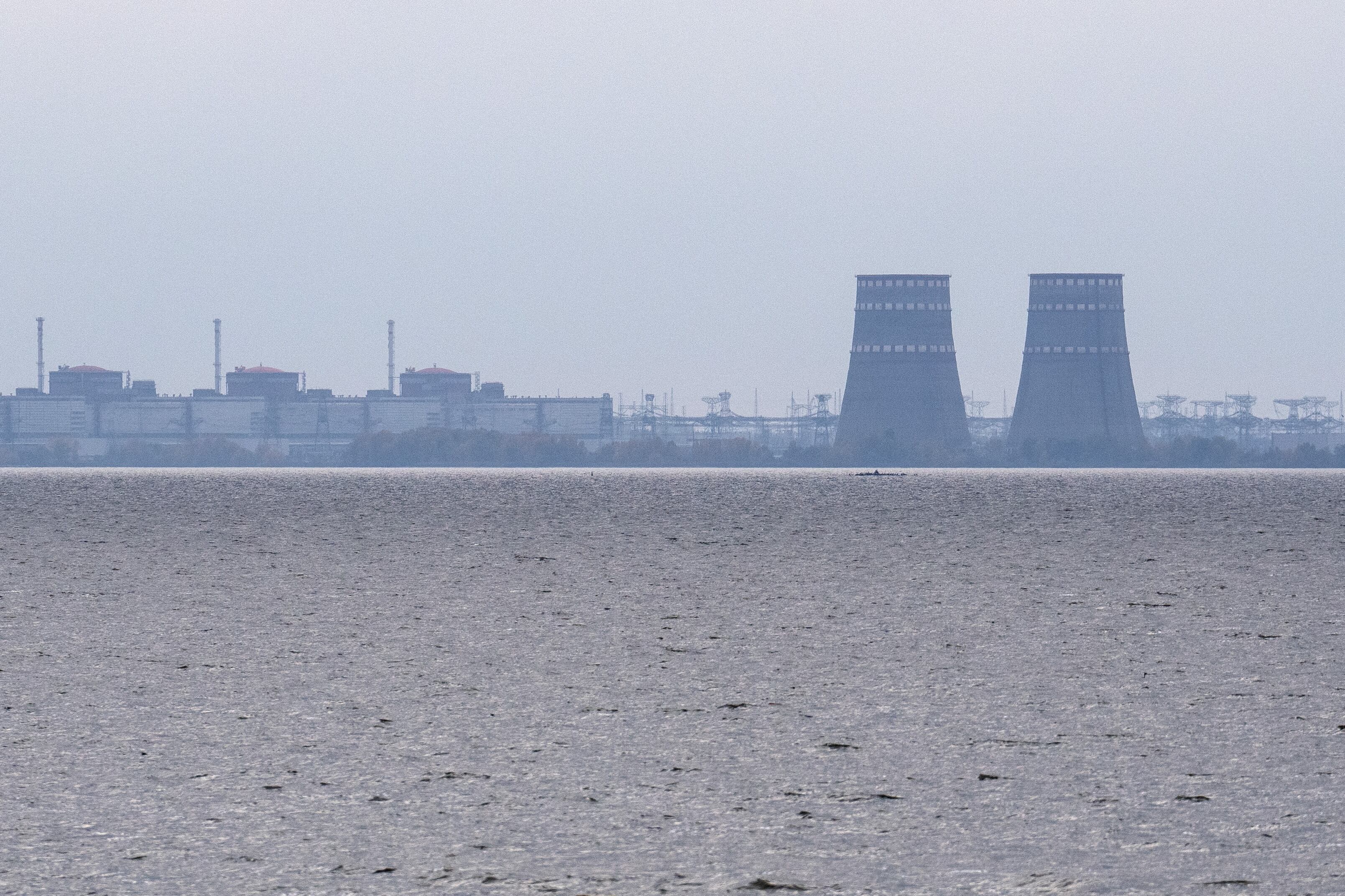 PRYDNIPROVSKE, UKRAINE - OCTOBER 29: Zaporizhzhia Nuclear Power Plant, Europe's largest nuclear power station and currently held by Russian occupying forces, is pictured on October 29, 2022 from Prydniprovske in Dnipropetrovsk oblast, Ukraine. Ukrainian forces have reportedly carried out a large-scale drone attack on Russia's Black Sea Fleet in the Crimean port city of Sevastopol according to Russian officials. Russia has accused British troops of involvement in the attack, the allegation has been denied by Britain's Ministry of Defence. (Photo by Carl Court/Getty Images)