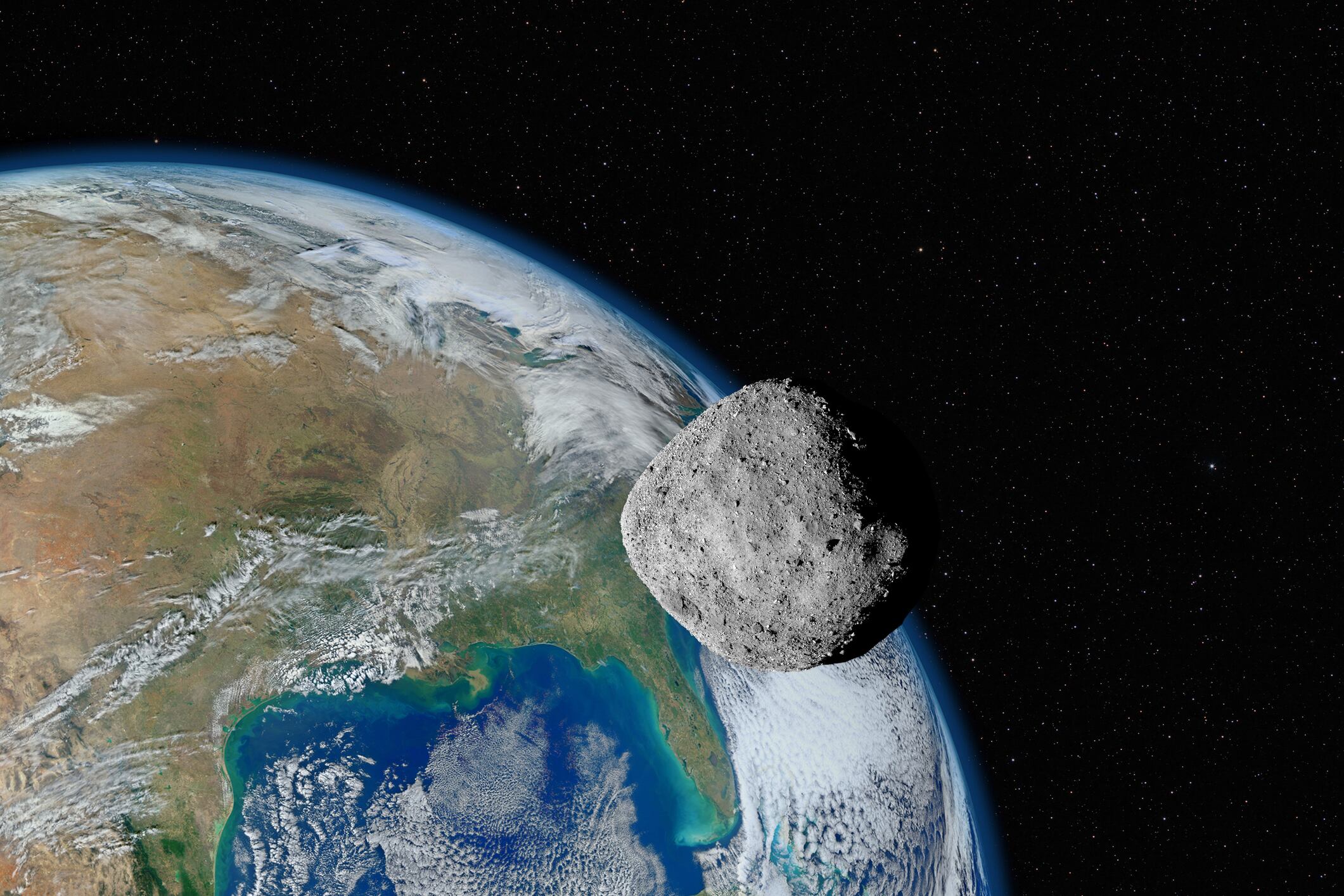 Asteroide Bennu y una vista al planeta Tierra / Getty Images