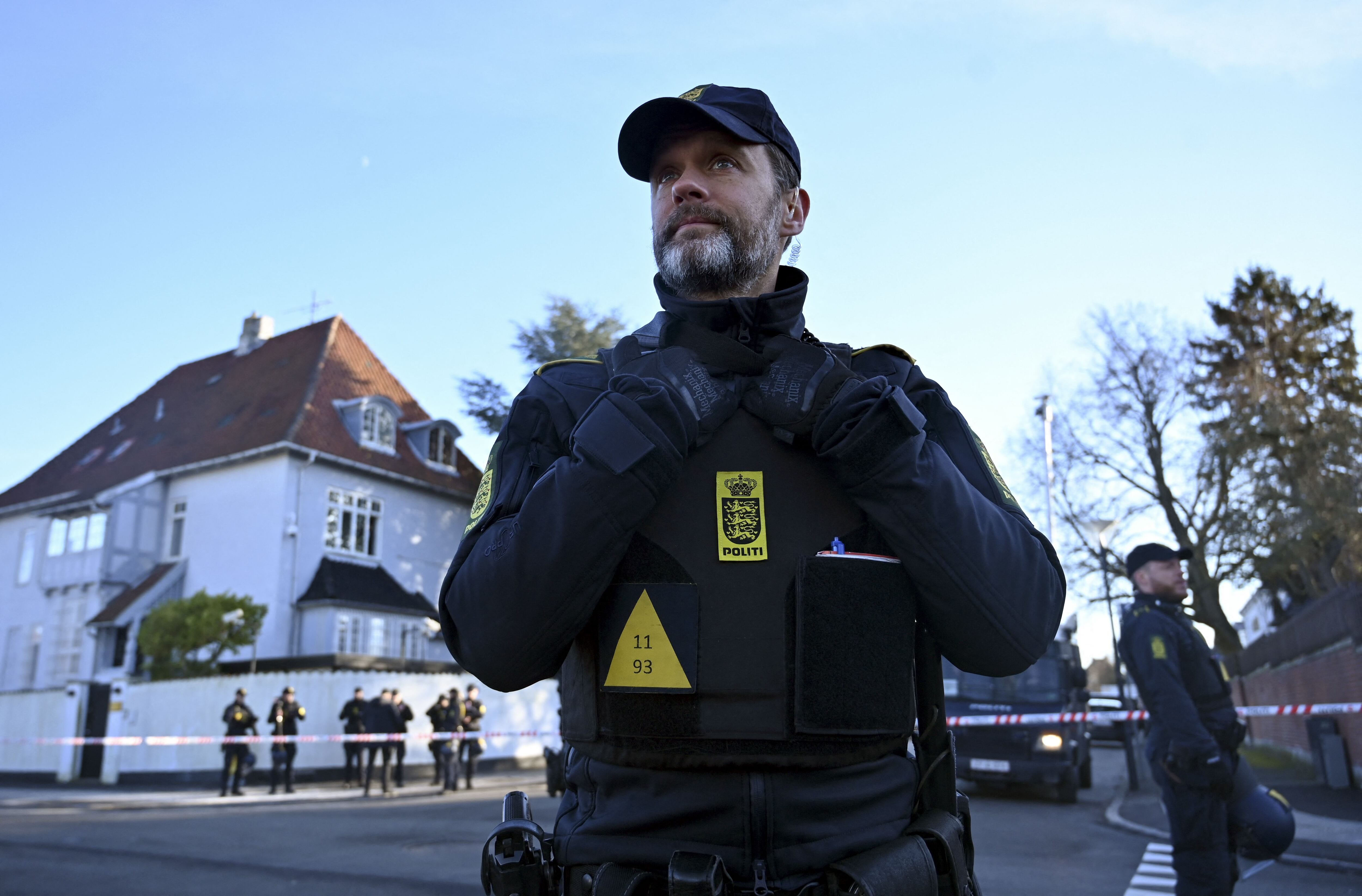 Police secure the area in front of the Turkish embassy in Copenhagen, where Danish far-right politician Rasmus Paludan has annonced to burn a copy of the Koran on January 27, 2023. - Turkey summoned Denmark's ambassador on January 27, 2023 to condemn a protest at which far-right extremist Paludan burned the Koran over Ankara's refusal to let Sweden and Finland join NATO. (Photo by Sergei GAPON / AFP) (Photo by SERGEI GAPON/AFP via Getty Images)