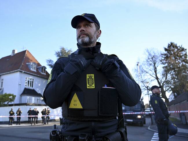 Police secure the area in front of the Turkish embassy in Copenhagen, where Danish far-right politician Rasmus Paludan has annonced to burn a copy of the Koran on January 27, 2023. - Turkey summoned Denmark's ambassador on January 27, 2023 to condemn a protest at which far-right extremist Paludan burned the Koran over Ankara's refusal to let Sweden and Finland join NATO. (Photo by Sergei GAPON / AFP) (Photo by SERGEI GAPON/AFP via Getty Images)