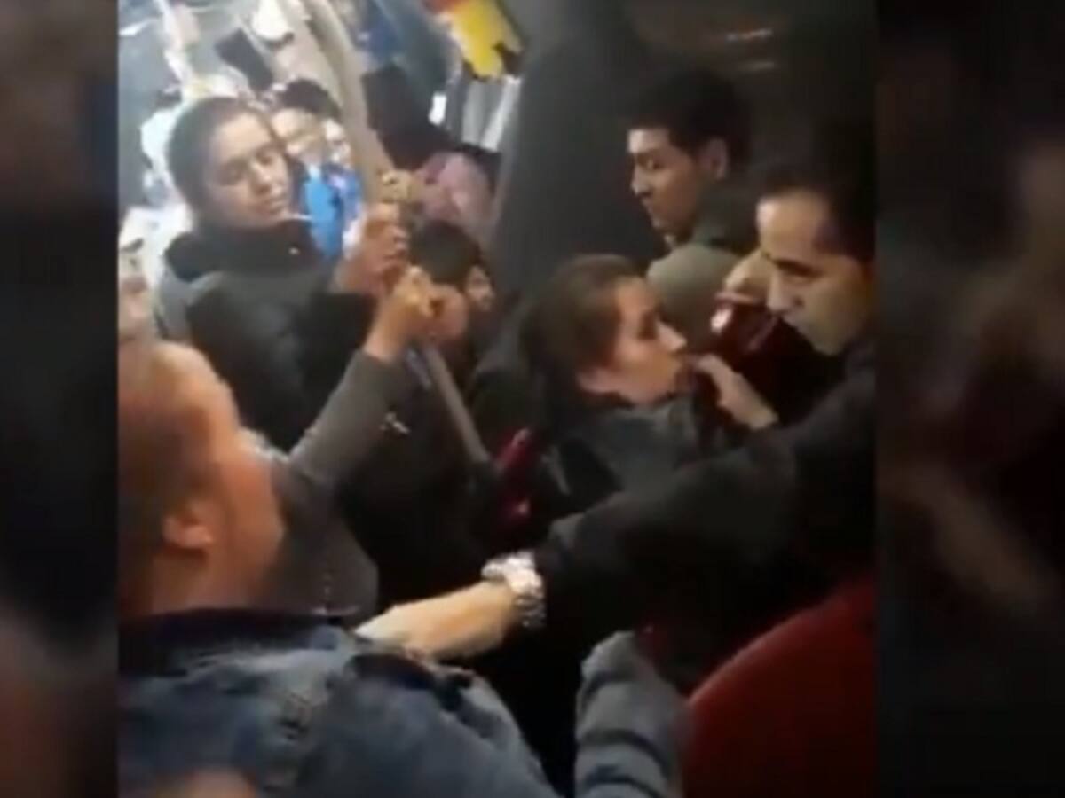 ¡Infraganti! Mujer pilló a su esposo con su amante en Transmilenio