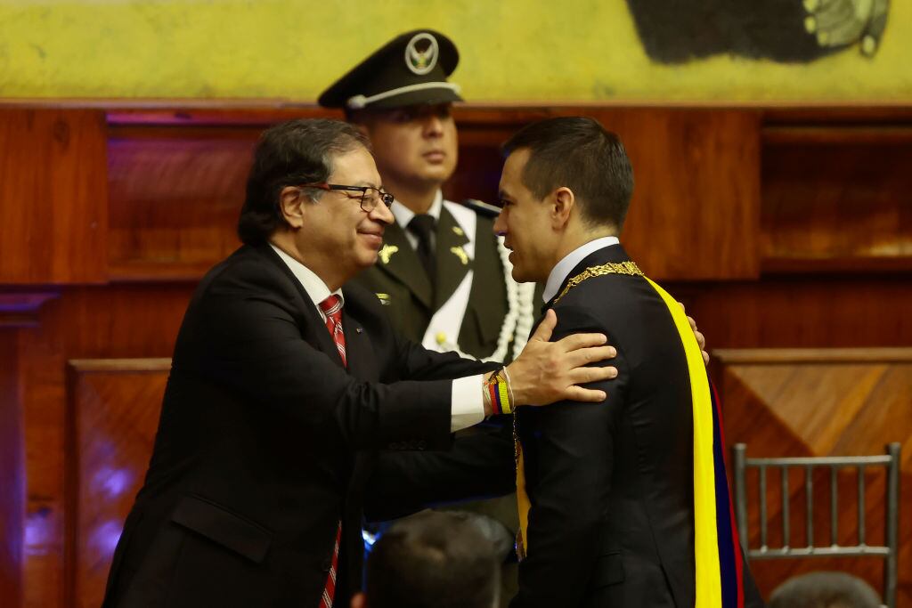 QUITO, ECUADOR - NOVEMBER 23: Newly elected President Daniel Noboa (R) greets with President of Colombia Gustavo Petro during the presidential inauguration at the Ecuadorean National Assembly on November 23, 2023 in Quito, Ecuador. Noboa will complete the 2021-2025 period after President Guillermo Lasso applied the "cross death" to dissolve parliament and call for early elections. (Photo by Franklin Jacome/Getty Images)