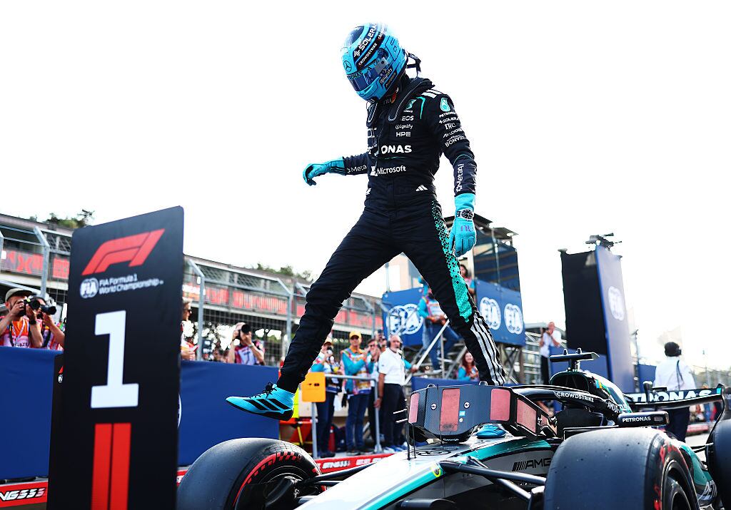 BAKU, AZERBAIJAN - SEPTEMBER 25: Pole position qualifier George Russell of Great Britain and Mercedes AMG Petronas F1 Team arrives in parc ferme during qualifying ahead of the F1 Grand Prix of Azerbaijan at Baku City Circuit on September 25, 2026 in Baku, Azerbaijan. (Photo by Bryn Lennon - Formula 1/Formula 1 via Getty Images)