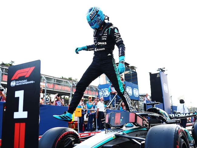 BAKU, AZERBAIJAN - SEPTEMBER 25: Pole position qualifier George Russell of Great Britain and Mercedes AMG Petronas F1 Team arrives in parc ferme during qualifying ahead of the F1 Grand Prix of Azerbaijan at Baku City Circuit on September 25, 2026 in Baku, Azerbaijan. (Photo by Bryn Lennon - Formula 1/Formula 1 via Getty Images)