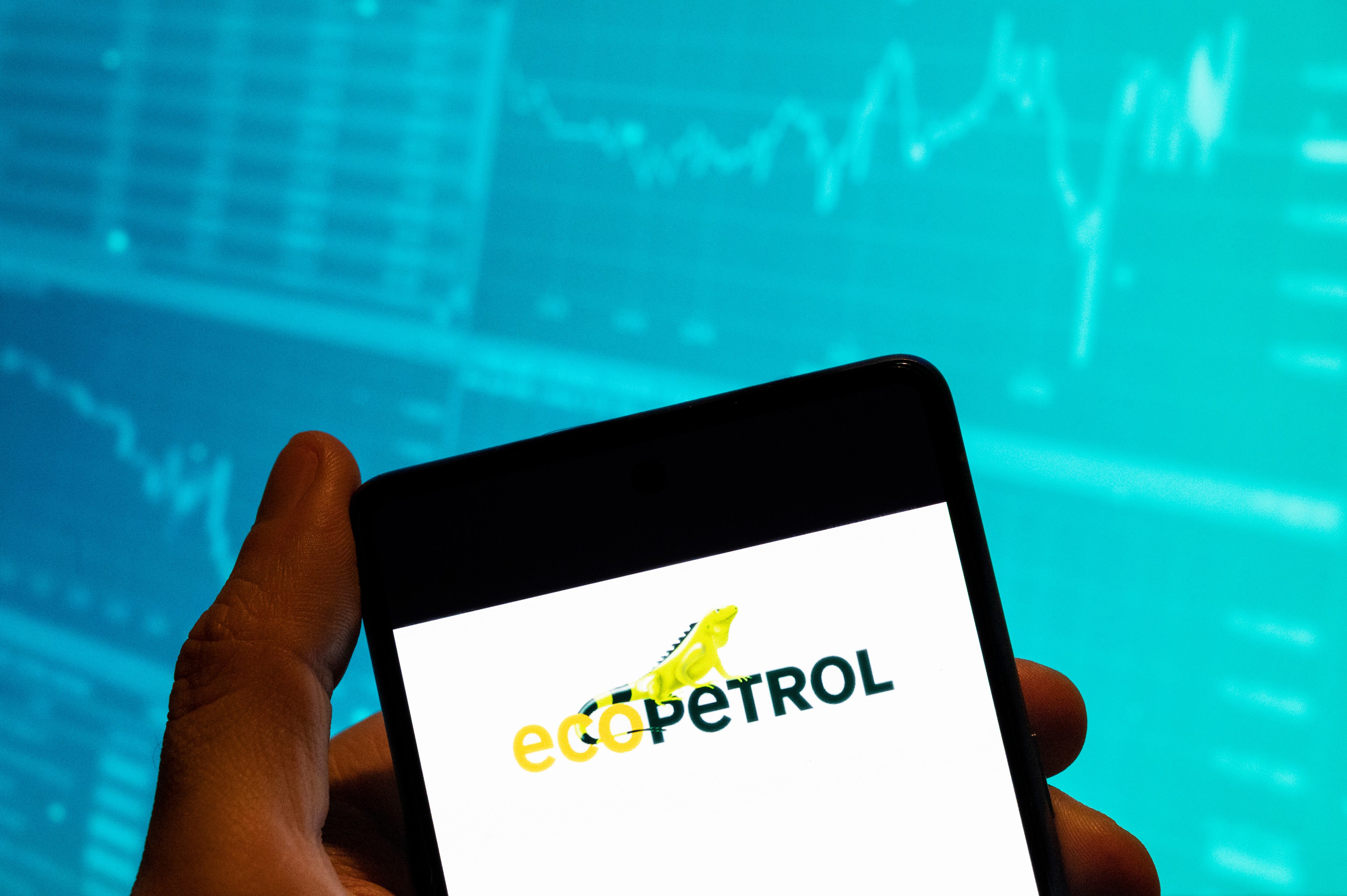 CHINA - 2023/02/19: In this photo illustration, the Colombian oil and gas company, Ecopetrol logo is seen displayed on a smartphone with an economic stock exchange index graph in the background. (Photo Illustration by Budrul Chukrut/SOPA Images/LightRocket via Getty Images)