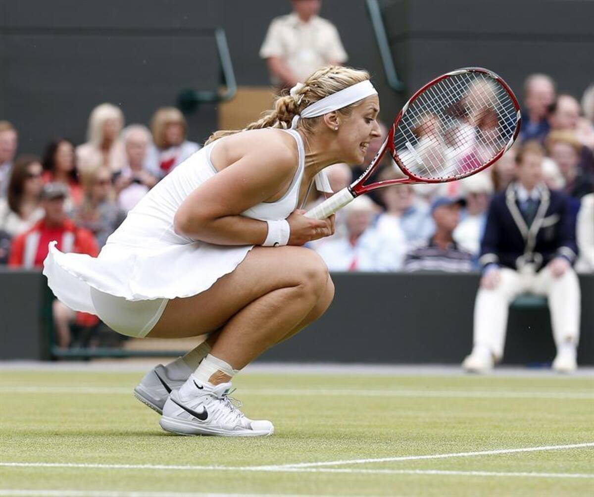 La tenista alemana Sabine Lisicki celebra su victoria ante la estonia Kaia Kanepiel, tras el partido de cuartos de final del torneo de tenis de Wimbledon.