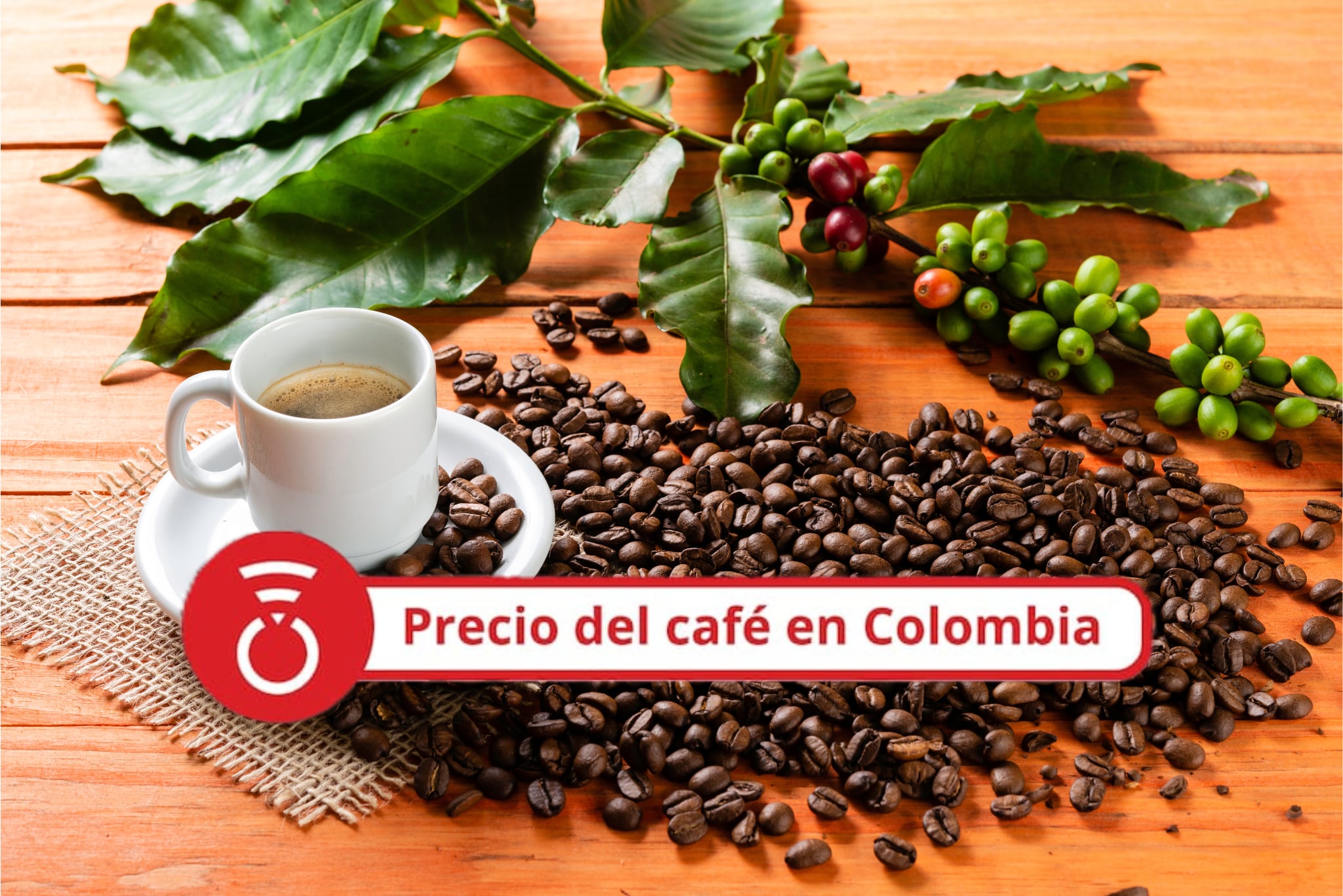 Taza blanca de café caliente sobre mesa de madera. Foto Getty Images